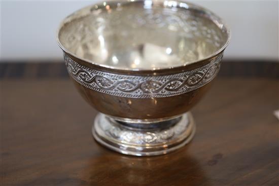 A silver rose bowl, engraved with bands of scrolling acanthus, Liberty & Co, Birmingham 1917 and three pairs of silver specimen vases,